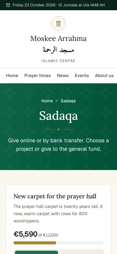 A mosque's sadaqa page on a phone, with a project and online giving